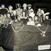 Christmas float from Crestview Elementary - 1953. Phyliss Humphrey Wilkinson in front of toy car, Judi Kiphart Helgeson behind it...Who else is in the toy bag?